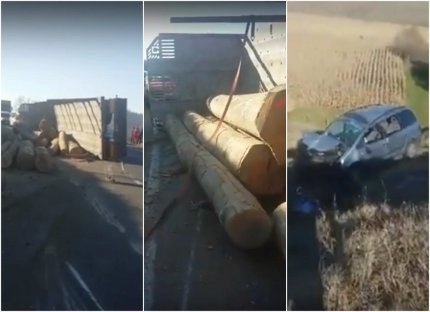 Tir cu lemne răsturnat peste o maşină în Sibiu