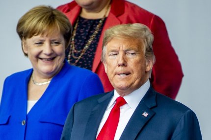 Donald Trump şi Angela Merkel, la summitul NATO de la Bruxelles