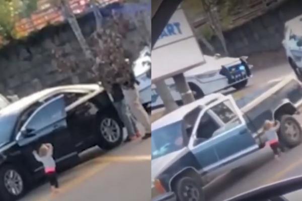Fetiţa de doi ani a ieşit cu mâinile ridicate, în faţa poliţiştilor