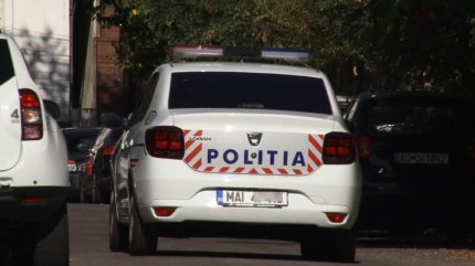 Polițistă ameninţată şi agresată de un comisar-șef