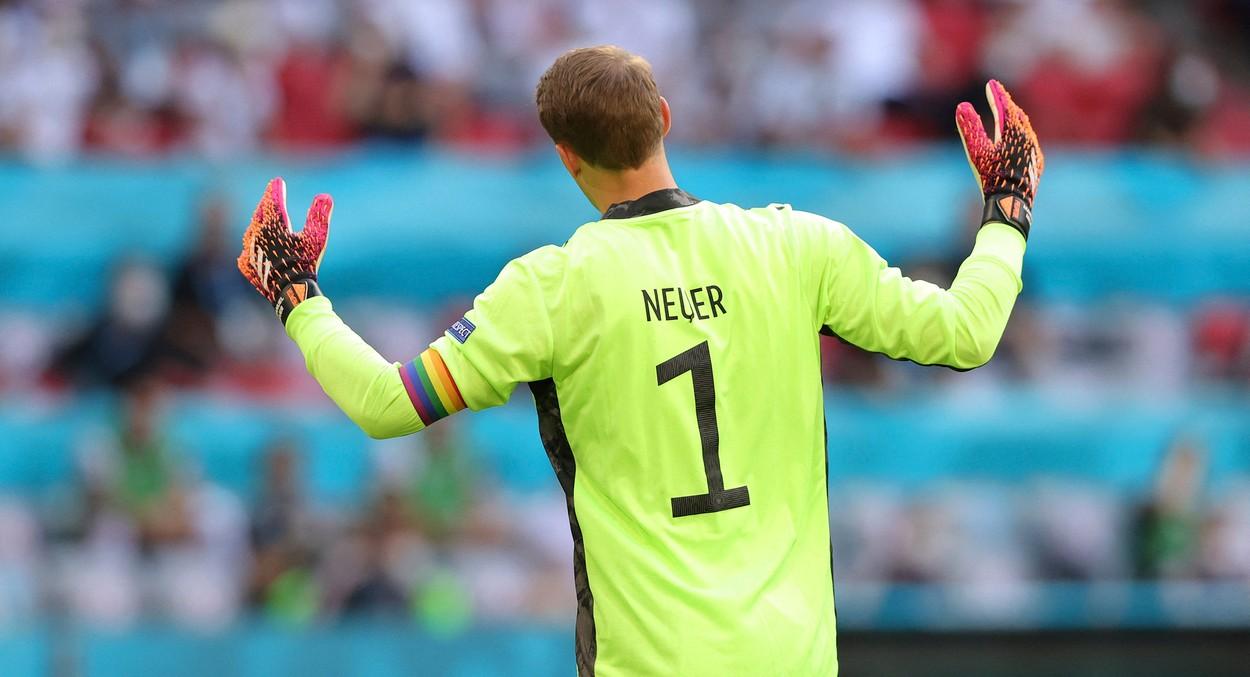 UEFA a dezamorsat scandalul pornit la Portugalia - Germania: nu-i va sancţiona pe nemţi pentru banderola "curcubeu" purtată de Manuel Neuer UEFA a dezamorsat scandalul pornit la Portugalia - Germania: nu-i va sancţiona pe nemţi pentru banderola "curcubeu" purtată de Manuel Neuer