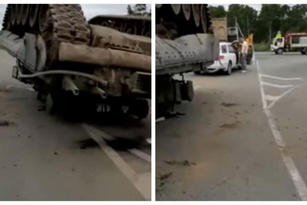 Armata Rusiei a scăpat un tanc de luptă pe șosea. Mastodontul de 40 de tone s-a răsturnat și a făcut gaură în asfalt