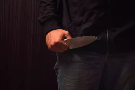 Cuţit Bărbat cu un cuţit în mână