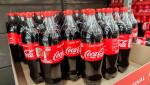 De ce nu se desprinde capacul noilor sticle de Coca-Cola