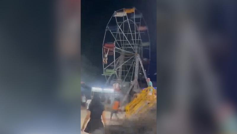 Momentul în care o fată de 13 ani, blocată în roata mare, cade 7 metri în gol, sub ochii prietenei de 11 ani. Ca prin minune, brazilianca a scăpat cu răni uşoare