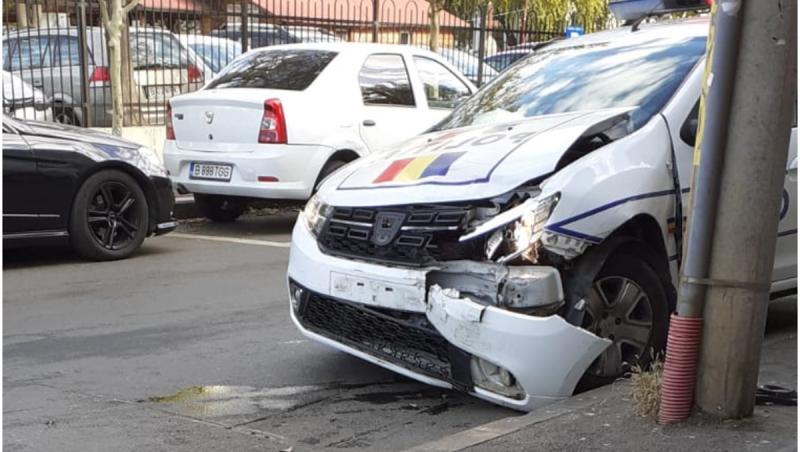 Accident între o mașină de poliție și un autoturism, în centrul Capitalei. În autospecială se aflau două persoane reţinute