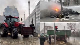 Haosul continuă la Bruxelles. Fermierii furioşi au luat cu asalt centrul oraşului şi au incendiat anvelope. Poliţiştii au intervenit cu tunuri de apă
