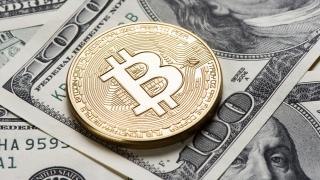 Bitcoin a atins cea mai mare valoare din 2021 încoace. Moneda a depăşit 60.000 de dolari şi se apropie de recordul absolut