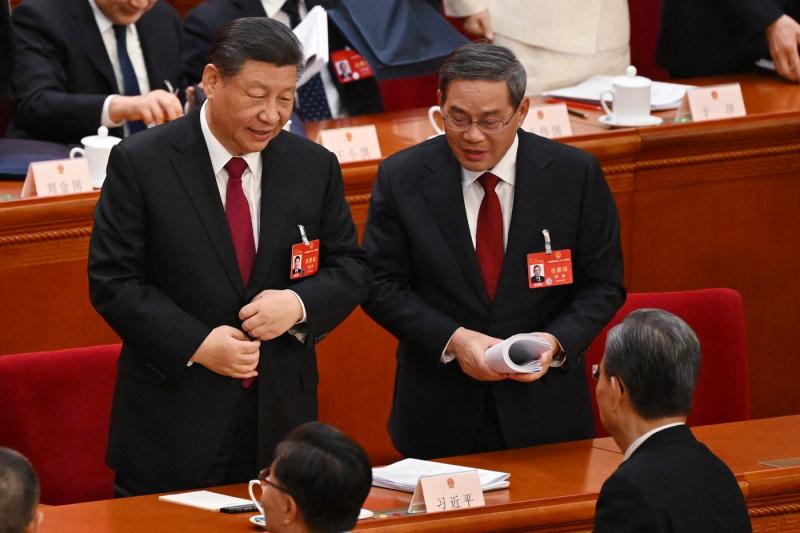 China a renunţat la cuvântul "paşnic" în "reunificarea" cu Taiwan şi promite că va "transforma" economia