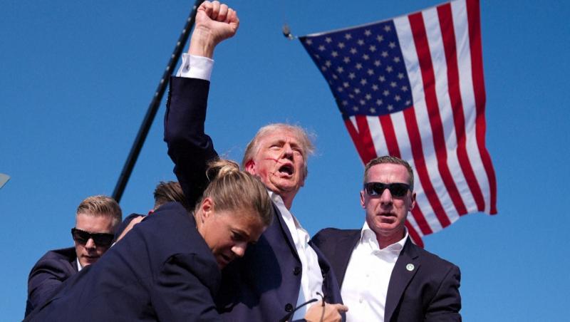 O fotografie cu Donald Trump face înconjurul lumii după tentativa de asasinat. Fotojurnalistul Evan Vucci povesteşte cum a surprins momentul