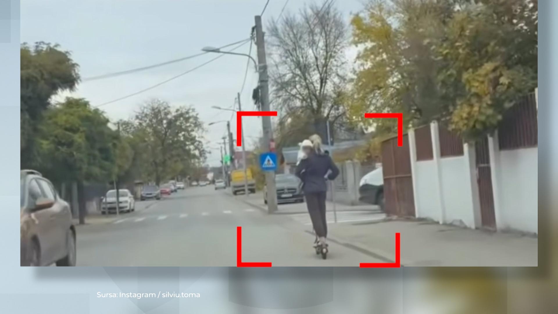 Femeie, filmată pe trotineta electrică cu un bebeluș în brațe. Ce pedeapsă riscă după ce va fi identificată