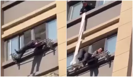 Un chinez de 80 de ani a supravieţuit unei căderi de la etajul 15, după ce a rămas agăţat de un suport de rufe