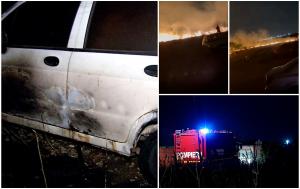Incendiu puternic de vegetaţie în Rahova, flăcările au cuprins şi o maşină. Pompierii au intervenit cu 7 autospeciale