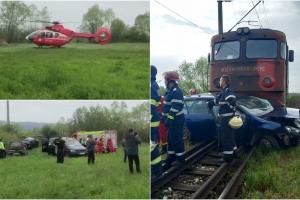 Șofer mort în mașina făcută praf de tren, în Harghita. Tânărul a traversat calea ferată fără să se asigure