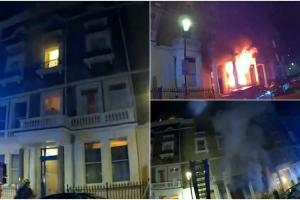 Incendiu uriaș în vestul Londrei. Momentul în care polițiștii lovesc cu piciorul ușa blocului apoi fug în clădire pentru a-i evacua pe locatari