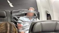 Bărbat de 67 de ani, legat de scaun cu bandă adezivă după un scandal în avion