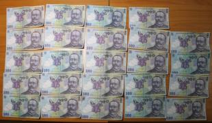 Percheziţii la persoane care au falsificat și au introdus pe piață bancnote de 100 de lei