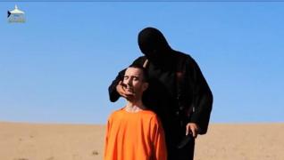 Imagini şocante! Britanicul David Haines, DECAPITAT de jihadişti!