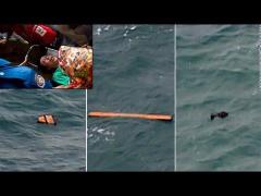 Una dintre cele două cutii negre ale avionului AirAsia, recuperată din mare!