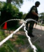 Doi ruși, arestați în Letonia după ce au fost prinși intrând într-o bază militară