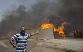 Cisiordania: Copil palestinian, ars de viu într-un incendiu provocat de israelieni