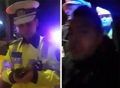 Scandal în stradă între un poliţist şi un taximetrist: 'Îmi rupi mâna! Spune-mi motivul pentru care m-ai oprit!' - VIDEO