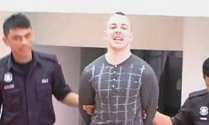 Românul condamnat la moarte în Malaezia, Ionuţ Gologan, a fost vizitat de ministrul Justiţiei. Ce i-a transmis Tudorel Toader