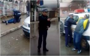 Delir pe o stradă din Tulcea. Un poliţist scoate pistolul după ce este lovit și înjurat de mulțimea furioasă, pentru că a încătușat un șofer (Video)