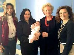 DE BASM! Fiica de nici două luni a unei românce fără adăpost din Napoli a fost botezată de Prinţesa Beatrice de Bourbon