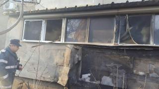 Copil bolnav de autism, SALVAT dintr-un apartament devastat de foc, în Slatina (GALERIE FOTO)