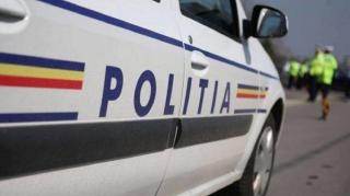 Incident la Primăria Arad! Un poliţist a fost atacat de un individ care purta mască ”Anonymous”