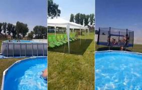 PISCINĂ și TRAMBULINĂ în curtea bisericii. Părintele a amenajat un loc de joacă pentru 100 de copii nevoiaşi din comuna Lada, Teleorman (VIDEO)