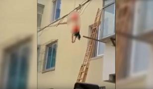 IMAGINI ŞOCANTE! Surprinsă în casă de nevasta iubitului, AMANTA sare pe geam şi se agaţă de cablurile electrice. Urmarea este DRAMATICĂ