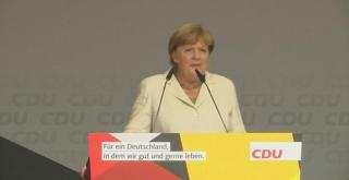 Angela Merkel, întâmpinată cu fluierături la un miting electoral, în Germania de Est