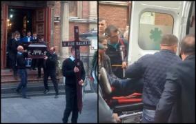 Imagini teribile la Craiova! Aurică Beldeanu, transportat în stare gravă la spital după ce sicriul lui Ilie Balaci a fost scos din biserică (Video)