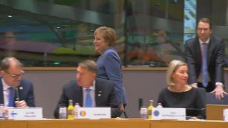 Angela Merkel la Consiliul European de la Bruxelles, lângă Klaus Iohannis