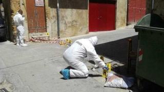 Anchetatori la locul crimei comise de români