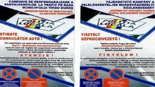 Fluturaşi bilingvi pentru şoferii care parchează ilegal în Târgu Mureş, în cadrul unei campanii a autorităţilor locale