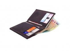 Închisoare cu executare pentru un bărbat din Iași care a găsit un portofel cu carduri și o hârtie cu coduri PIN