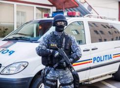 Percheziţii de amploare desfăşurate de Poliţia Capitalei într-un dosar de evaziune fiscală şi spălare a banilor