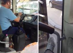 Şofer de microbuz din Bucureşti, filmat în timp ce fumează, numără bani, taie bilete şi conduce cu uşa deschisă