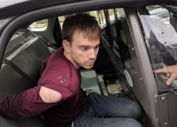 El e individul care a ucis patru oameni într-un restaurant din Nashville. Avea o puşcă semiautomată în rucsac în momentul arestării