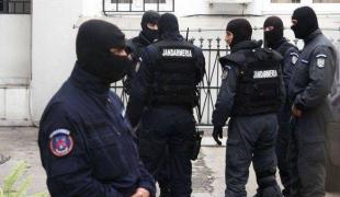 Percheziţii în Bucureşti şi în trei judeţe