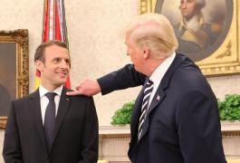 Trump l-a scuturat pe Macron de „mătreaţă”