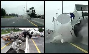 Imagini groaznice pe autostradă. Şoferul unui TIR a adormit la volan, fără centură de siguranţă. Maşina s-a izbit de un parapet şi a fost aruncat prin geam (video)