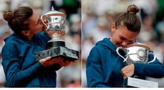 Simona Halep ține în brațe trofeul de la Roland Garros
