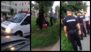 Un vecin a lovit o adolescentă cu toporul, deranjat de gălăgia din faţa apartamentului