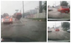 Maşină aruncată 2 metri în aer, la Botoşani, de capacul unei canalizări (Video)