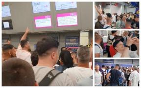 Românii blocaţi pe aeroportul din Luton din cauza vremii severe au huiduit, au cântat imnul şi au strigat: "Bucureşti" (Video)