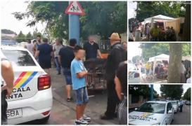 Au scos grătarele pe bulevard, au întins mesele și corturile și s-au pregătit să servească prânzul. Polițiștii le-au stricat planurile (Video)